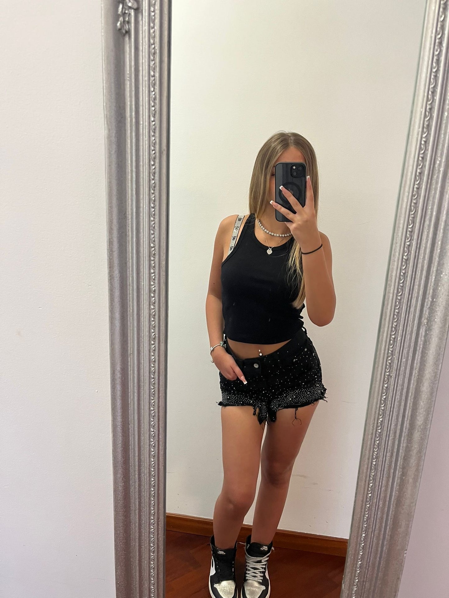 Shorts neri con brillantini