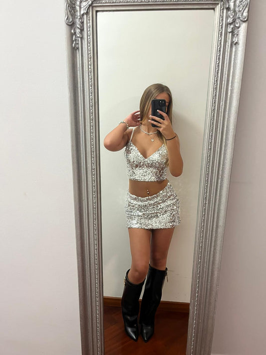 Top argentato con paillettes