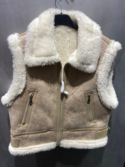 Montone smanicato beige